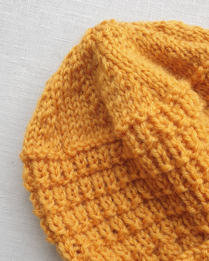 Knitted by Nana Merino Cuff Beanie Curry