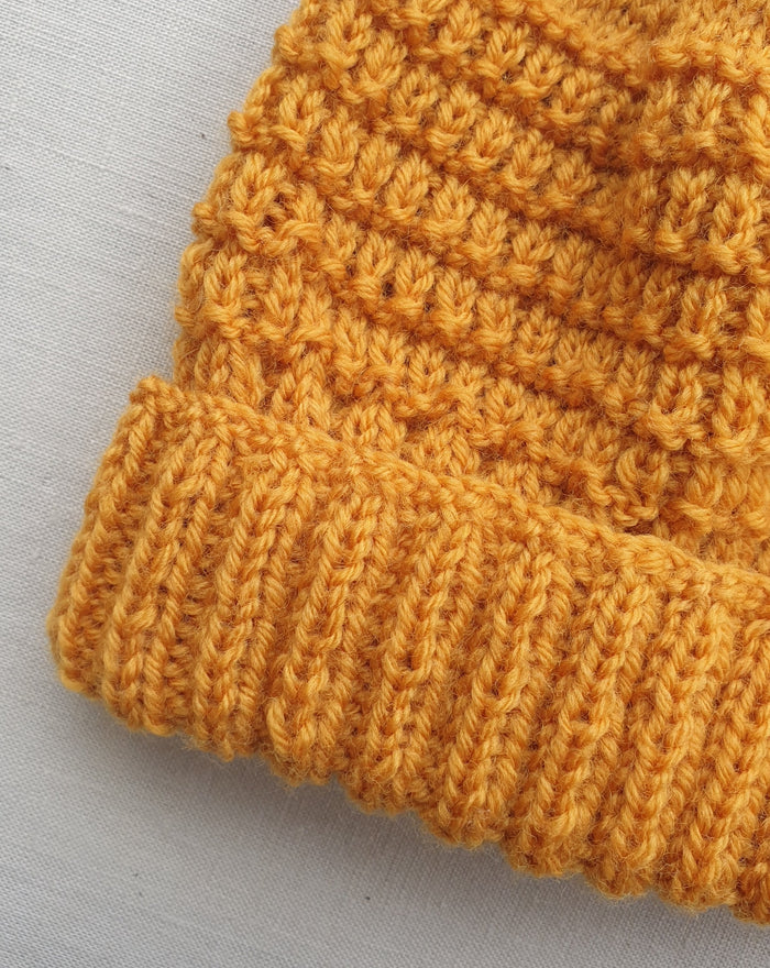 Knitted by Nana Merino Cuff Beanie Curry